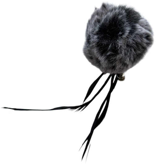 lightweight grey faux fur ball approximately 2" in diameter with small bell and 4" feather tail