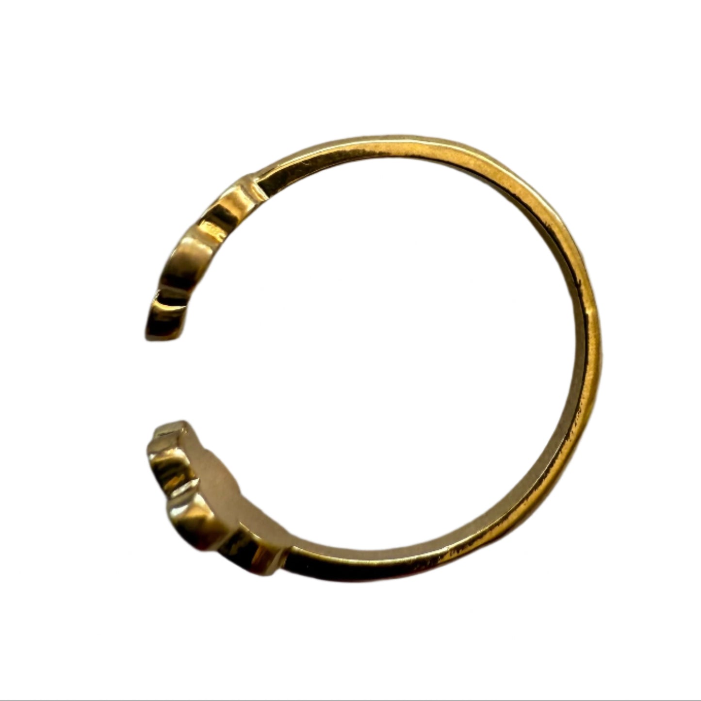 side view of gold paw print pinky ring