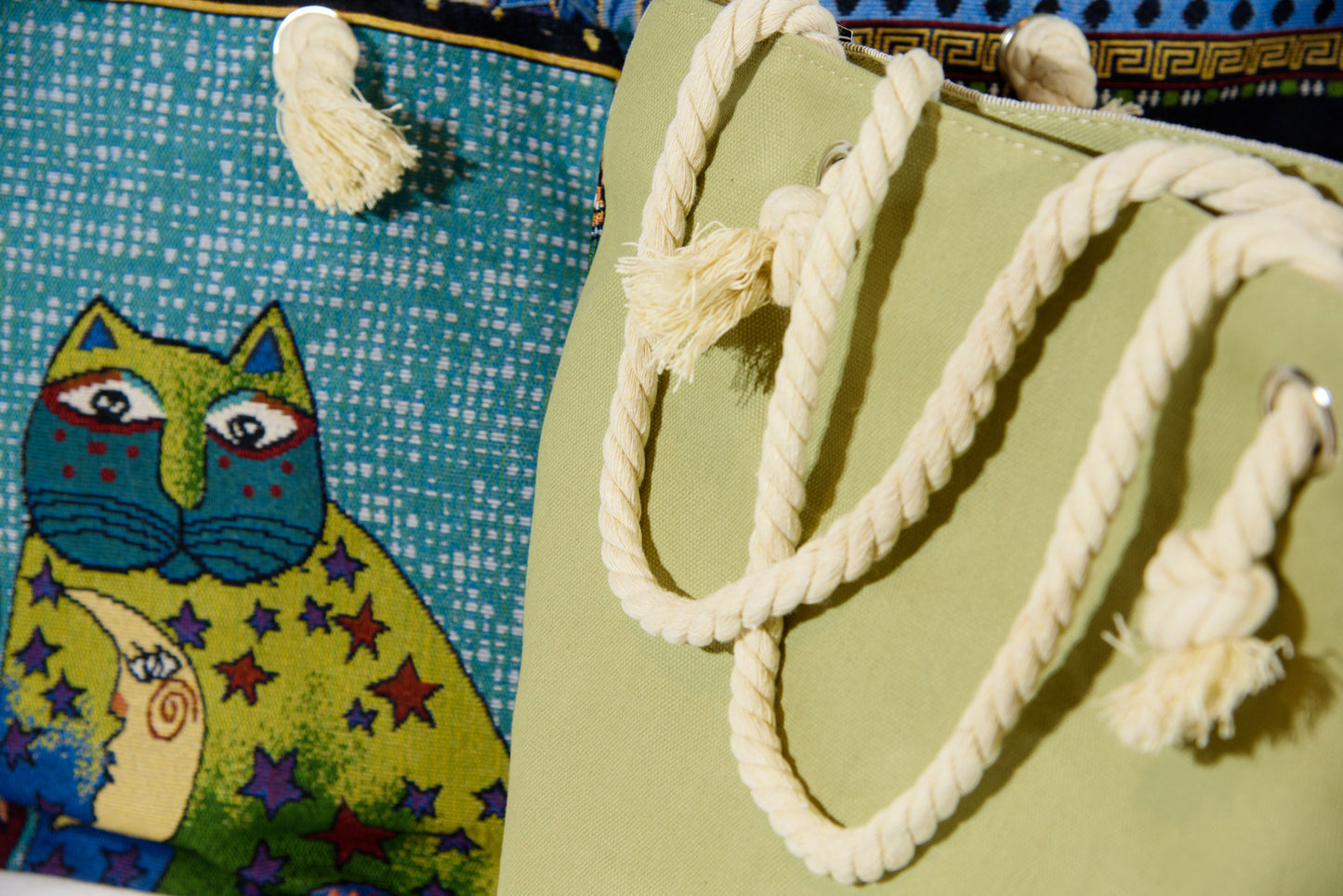 Close up of one of the super cute Laurel Burch cat with a moon on its chest.
