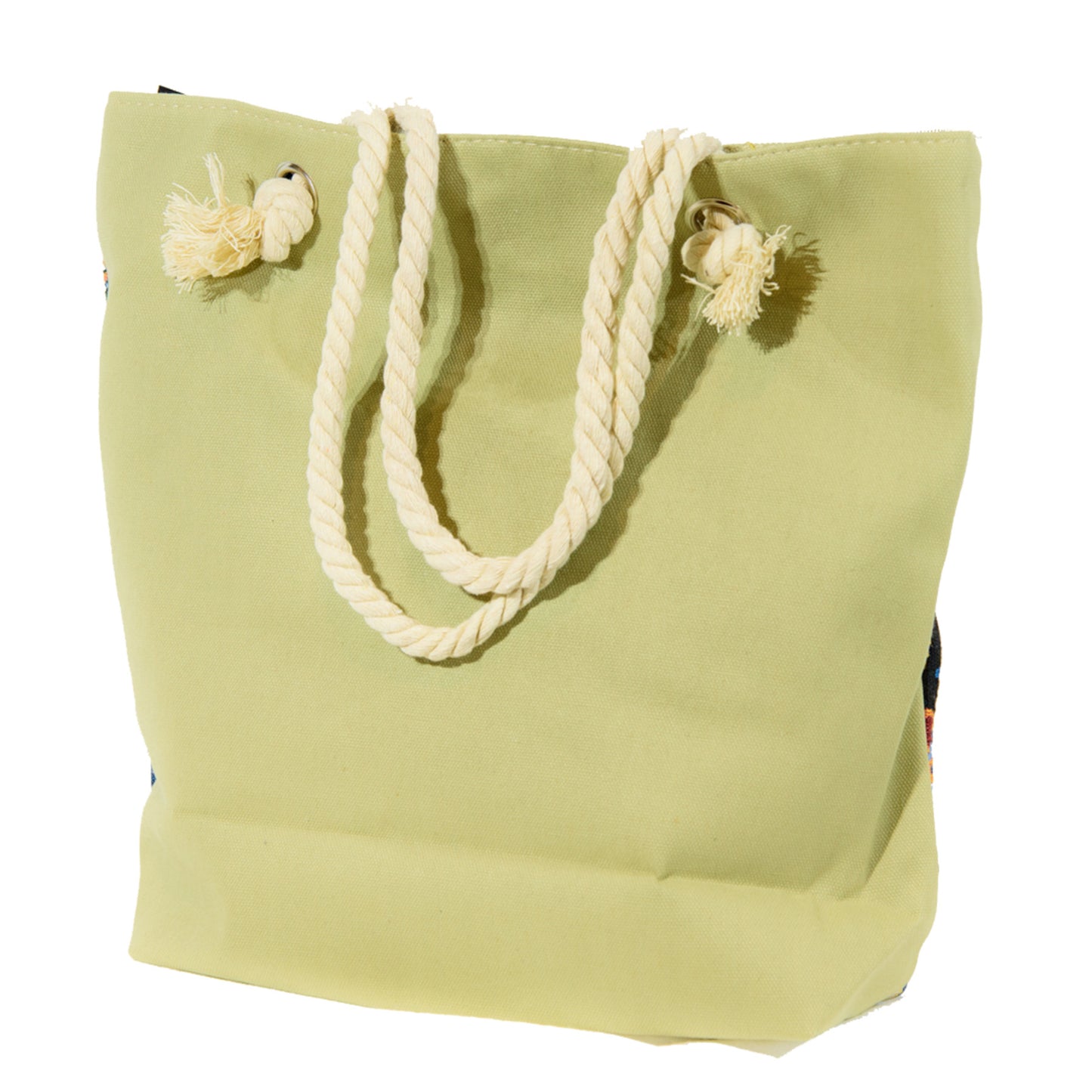 Closeup of the back of the bag with sage green and sturdy rope handles.