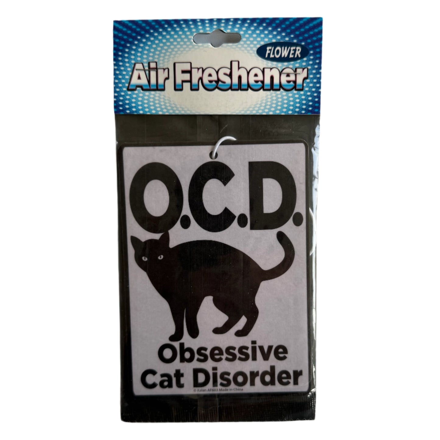 air freshener with OCD cat, vanilla scent, string loop to hang