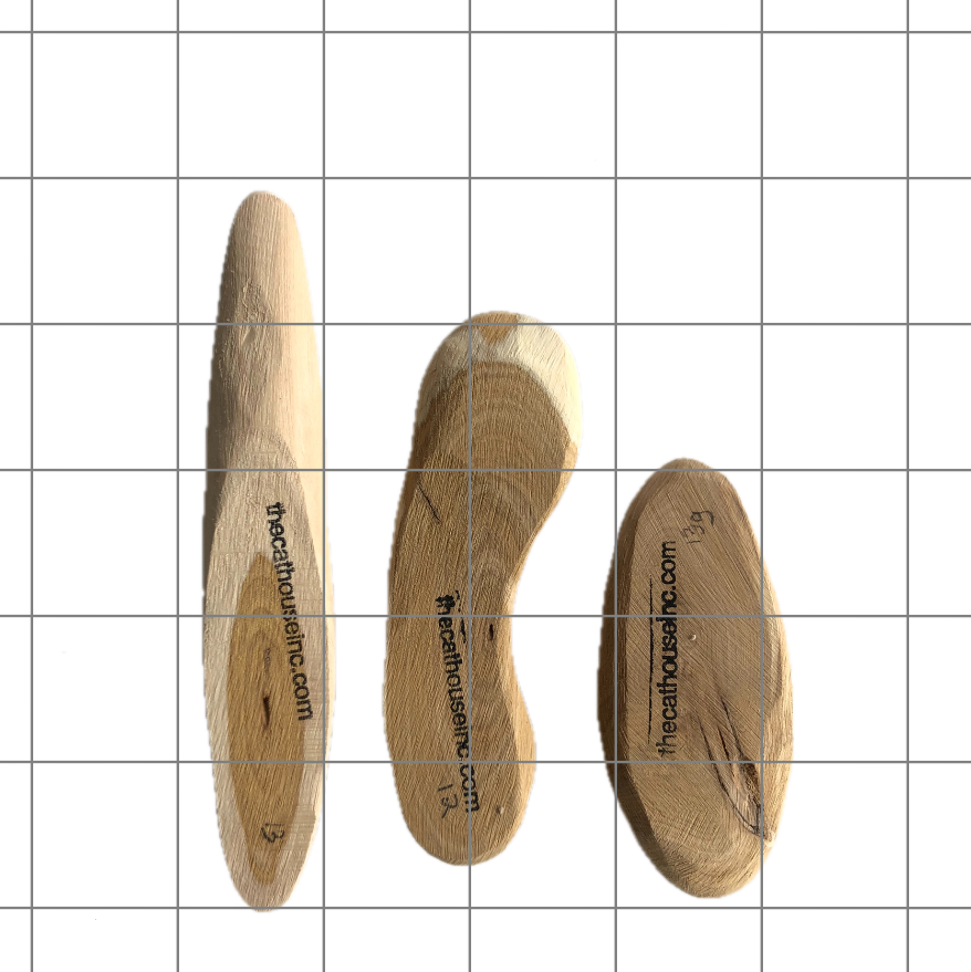 a few slices of Honeysuckle wood, pieces range in shape, size and weight in the 12 – 15g range, seen here against a 1" grid for reference