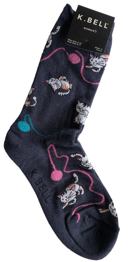 denim colour crew socks with white & orange cat playing with pink and blue balls of yarn