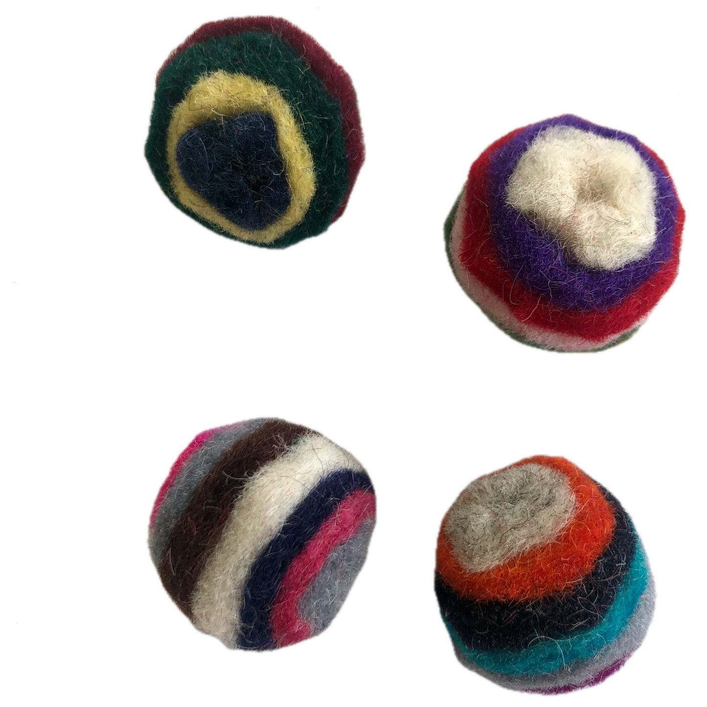 4 multicoloured cat toy balls, made out of  layered wool, are small enough for a cat to pick up with their mouth to carry or toss, they like bat them around and chase them. The layers of wool create a striped pattern which makes the ball more visually enticing as it rolls. Many cats have a natural attraction to the scent of wool. The balls are under an inch (2.5 cm) in diameter, just a little bit bigger than a quarter