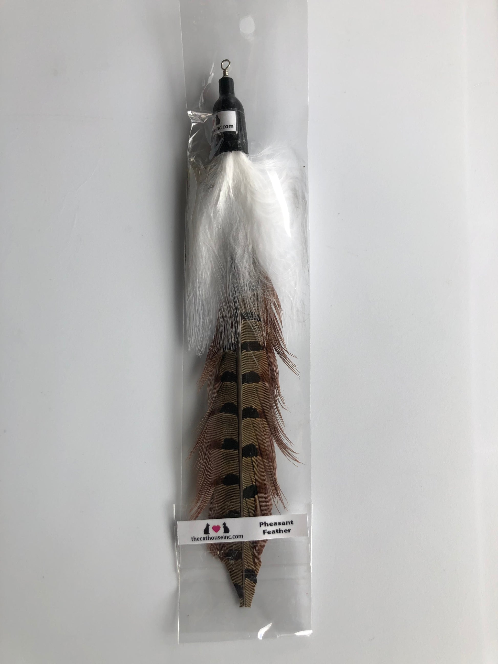 handmade pheasant feather attachment for wand or fishing rod, approx. 8", shown in packaging