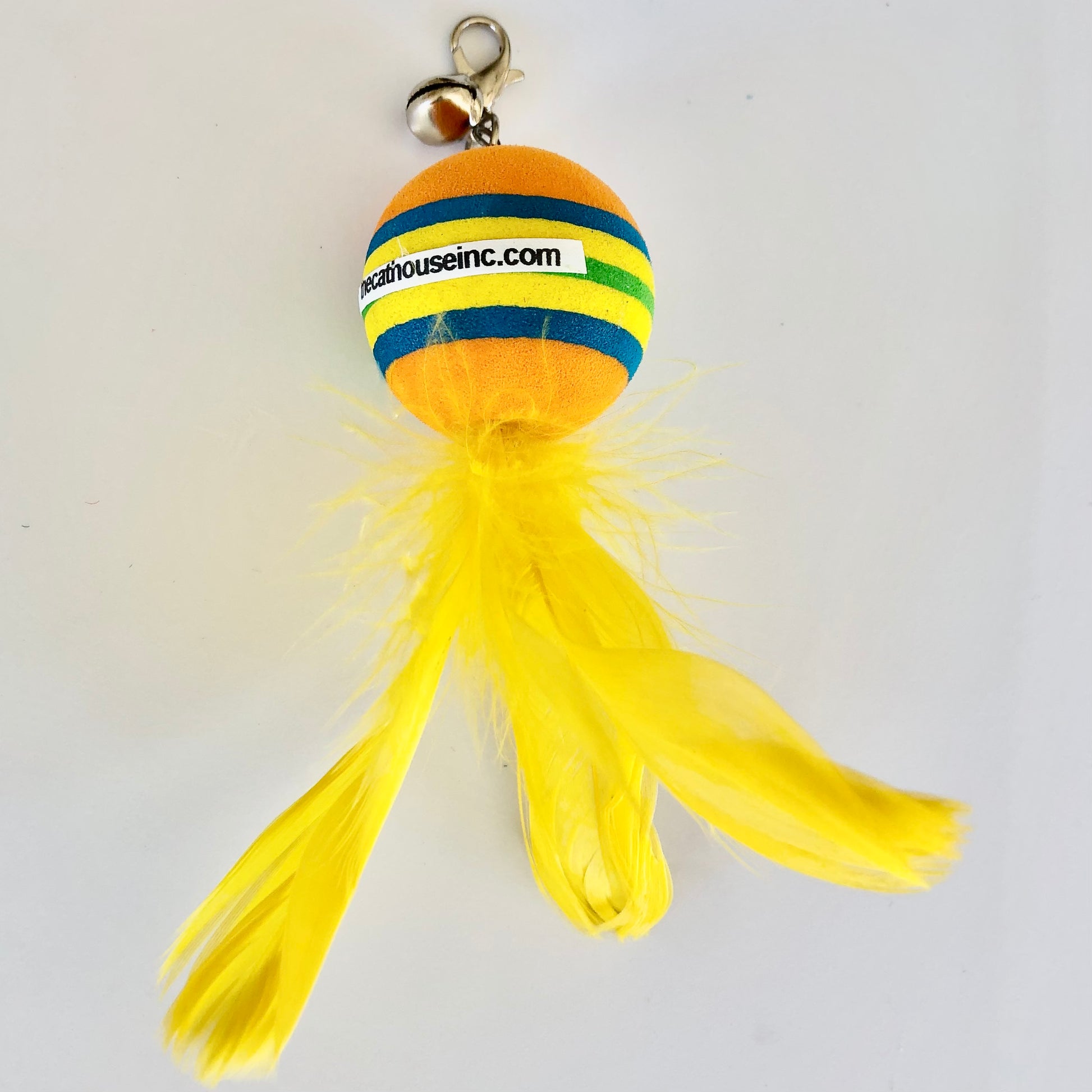 rainbow foam ball with yellow feather tail, small bell and easy open clasp, available with real or synthetic feather